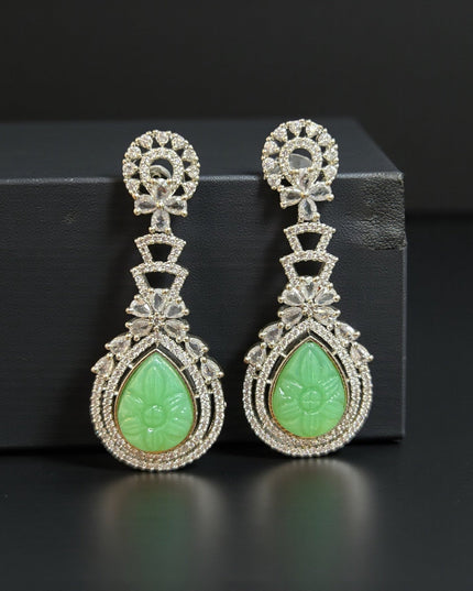 Green carved stone earrings by Kurti Connection USA