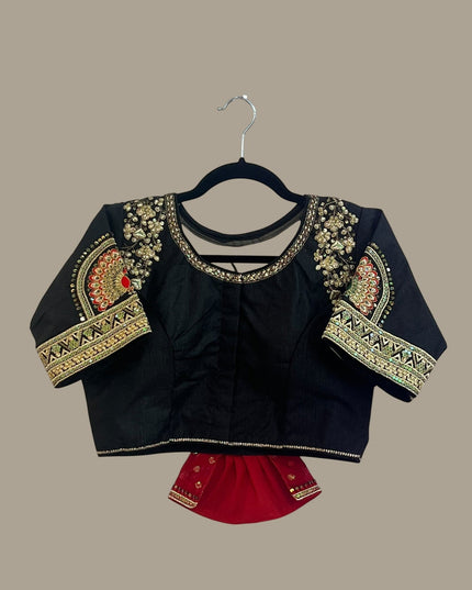 House Of Indian Wedding Attire black blouse with intricate gold, red, and green embroidery on neckline and sleeves.