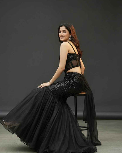 Black shimmer lehenga with corset blouse