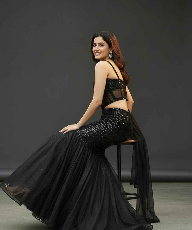 Black shimmer lehenga with corset blouse