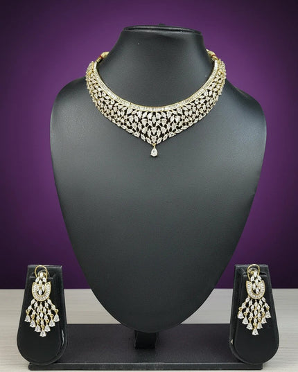 House Of Indian Wedding Attire gold-toned choker necklace and dangling earrings set with clear cubic zirconia stones.