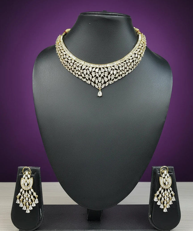 House Of Indian Wedding Attire gold-toned choker necklace and dangling earrings set with clear cubic zirconia stones.