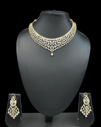 House Of Indian Wedding Attire gold-toned choker necklace with drop pendant and matching dangling earrings, adorned with clear cubic zirconia stones.