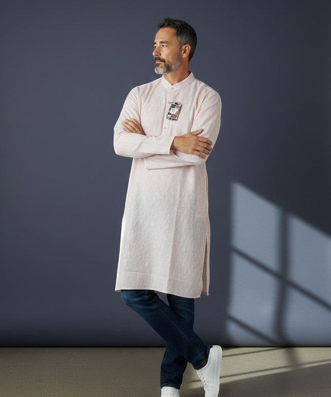 House Of Indian Wedding Attire light pink polyester kurta for men with a subtle textured pattern and a decorative patch on the chest.