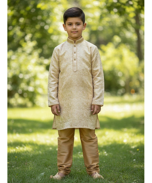 Kurti Connection USA boys cream jacquard kurti with embroidered mandarin collar and gold pajama pants in a garden