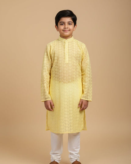Kurti Connection USA boys yellow embroidered kurta set with mandarin collar and white churidar trousers