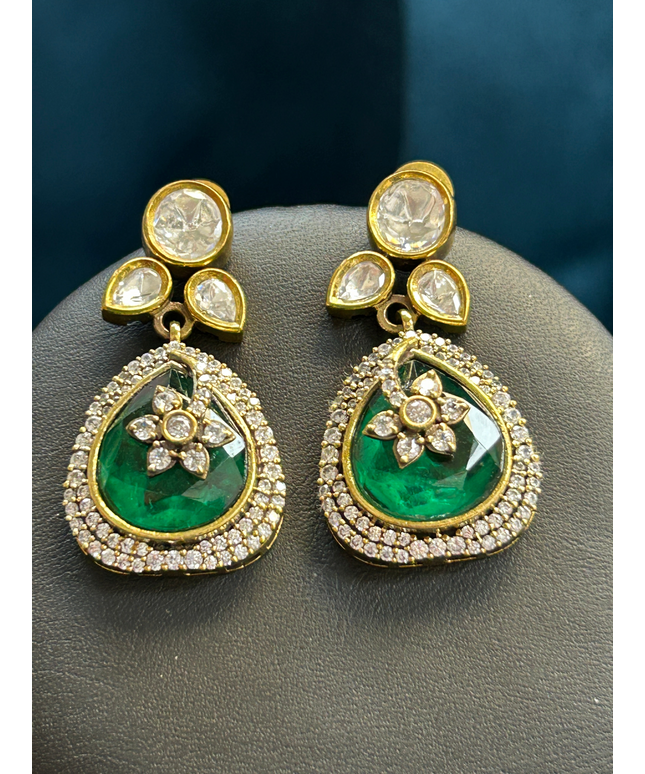 Kurti Connection USA elegant green teardrop drop earrings with white crystal halo and floral motif in gold setting