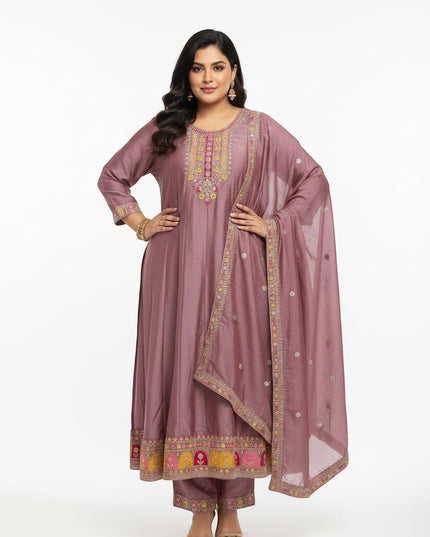 Kurti Connection USA mauve kurta set with intricate multi-colored embroidery on the neckline, hem, and dupatta.