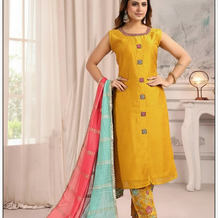 Kurti Connection USA mustard yellow sleeveless silk kurta set with floral trousers and a pink and turquoise dupatta.