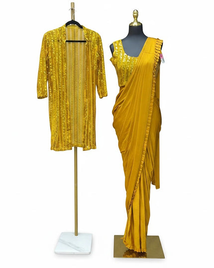Kurti Connection USA mustard yellow saree set with sequin shrug and ruffle border on a mannequin