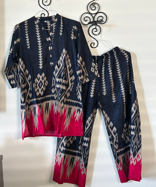 Kurti Connection USA navy tunic and trouser set with beige geometric patterns and vibrant pink hem accents.