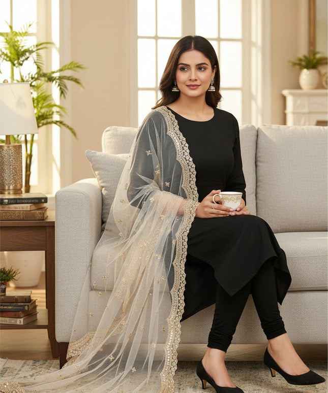 Kurti Connection USA net dupatta with gold embroidery and mirror work draped over a woman in a black kurta set