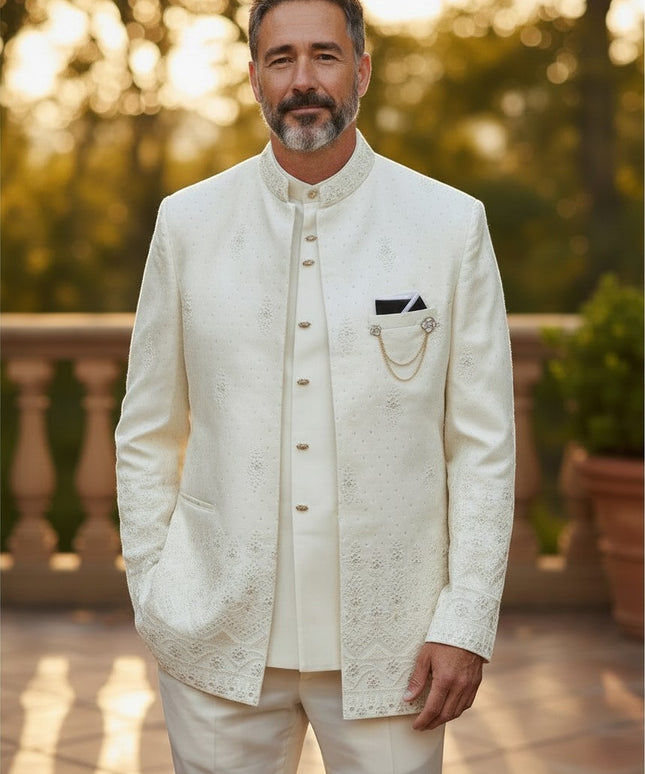 Man wearing a Kurti Connection USA off-white three-piece Indo-Western sherwani with intricate embroidery and gold chain