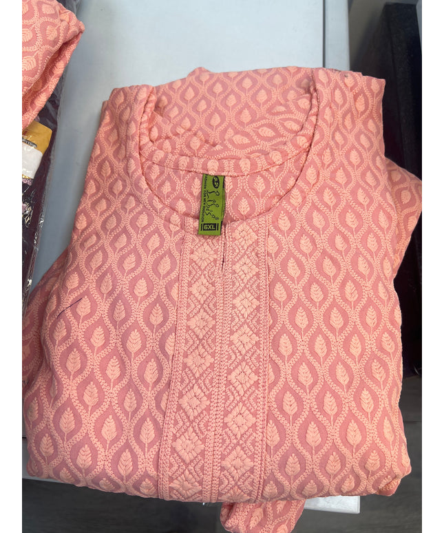 Kurti Connection USA peach kurti top with all-over leaf embroidery and textured front panel. Relaxed fit, round neckline.