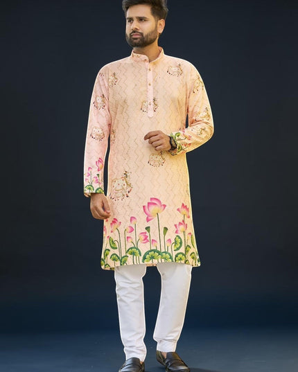 Kurti Connection USA men's peach floral print kurta with white pants, mandarin collar, button-down front, lotus motifs.