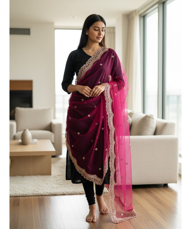 Kurti Connection USA dark pink net dupatta with intricate mirror work and scalloped embroidery worn over a black outfit