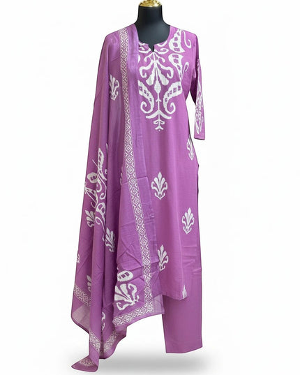 Kurti Connection USA purple three-piece suit set with white block-print motifs, matching trousers, and dupatta.