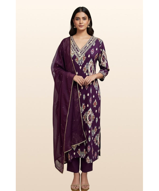 Model wearing a Kurti Connection USA purple ikat-patterned kurti set with V-neck embroidery and a sheer dupatta.