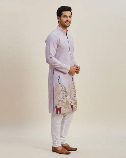 Kurti Connection USA light purple silk kurta set with intricate peacock and deer embroidery, paired with white pajama.