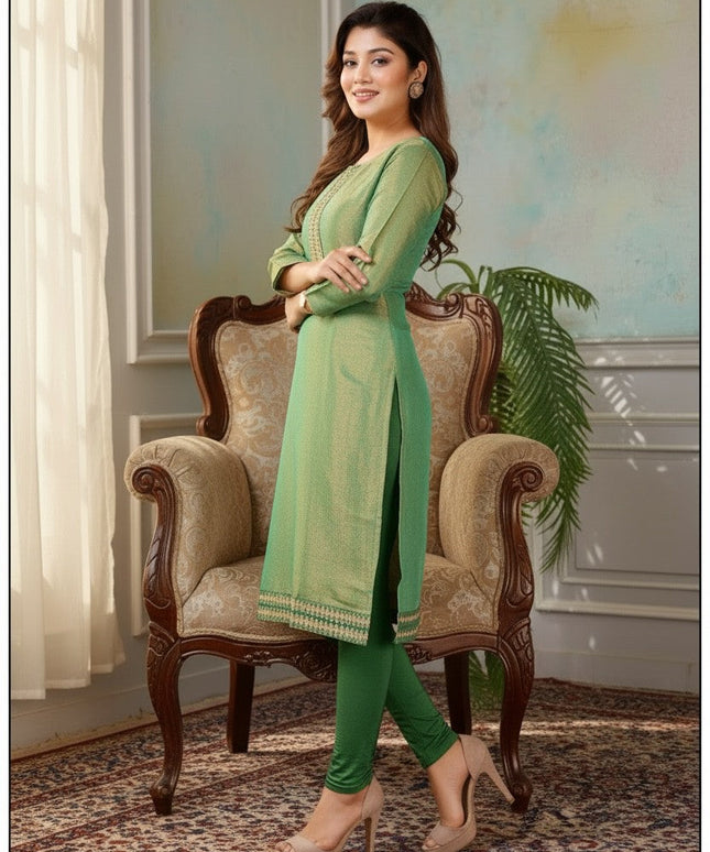 Kurti Connection USA sage green tissue silk kurti with intricate embroidery, three-quarter sleeves, and side slits.