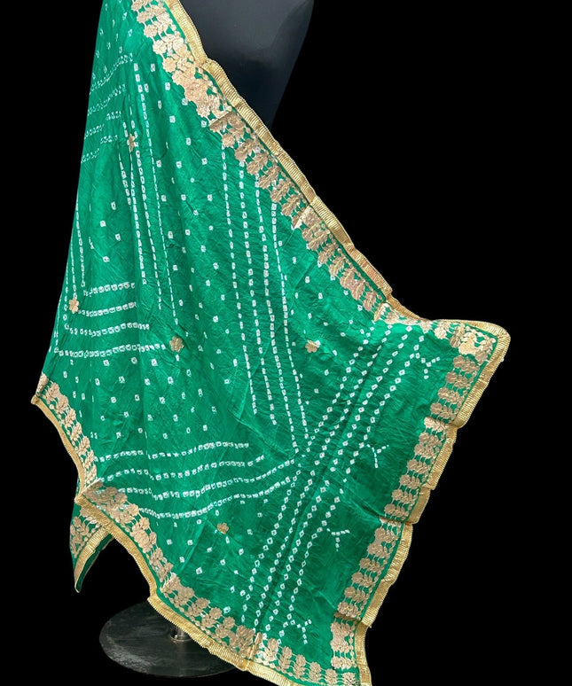 Kurti Connection USA sea green Bandhani dupatta with white tie-dye patterns and an ornate gold border.