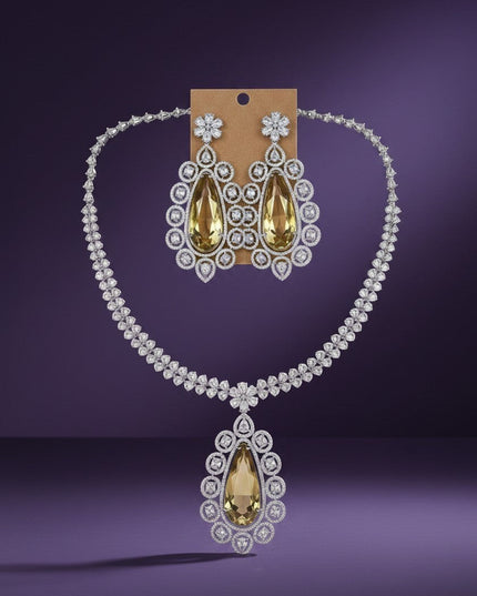 Kurti Connection USA statement necklace and earring set with pear-shaped yellow gemstones and cubic zirconia.