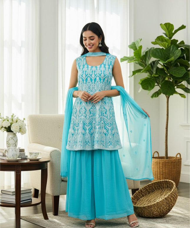 Kurti Connection USA turquoise georgette sleeveless kurti with white embroidery and matching sharara set and dupatta