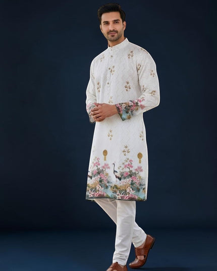 Kurti Connection USA men's white kurta with all-over embroidery and vibrant floral crane print on sleeves and hem.