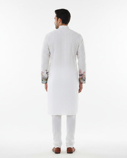 Kurti Connection USA white embroidered kurta with floral and crane printed sleeves and hem for men.