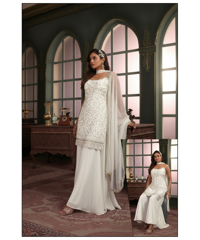 Kurti Connection USA white sleeveless kurti with silver embroidery and sequins, paired with palazzo pants and dupatta.