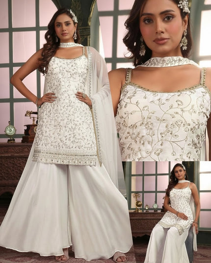 Kurti Connection USA white sleeveless kurti with silver embroidery, sequin work, palazzo pants, and matching dupatta.