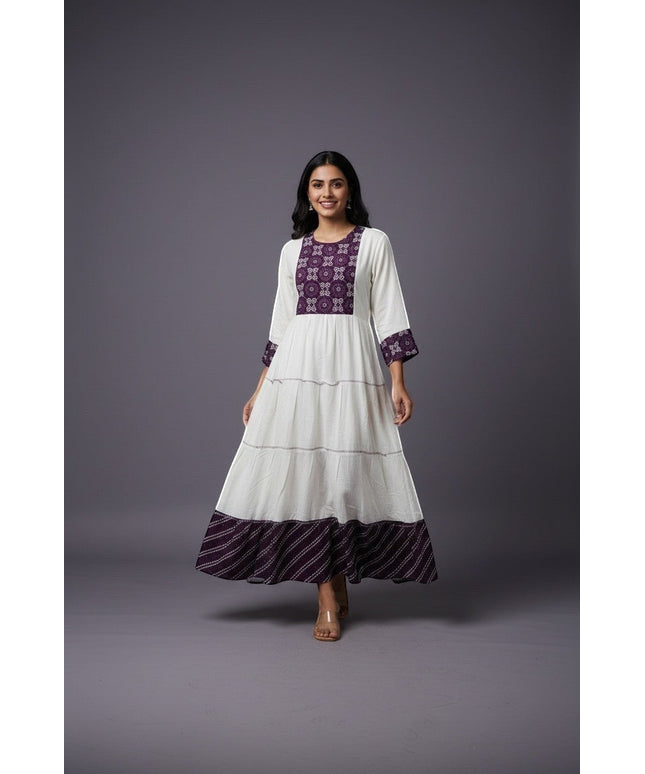 Kurti Connection USA white tiered maxi dress with purple embroidered yoke and cuffs, flowing silhouette.