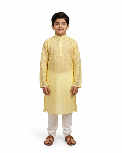 Kurti Connection USA boys yellow embroidered kurta set with white churidar trousers and a mandarin collar
